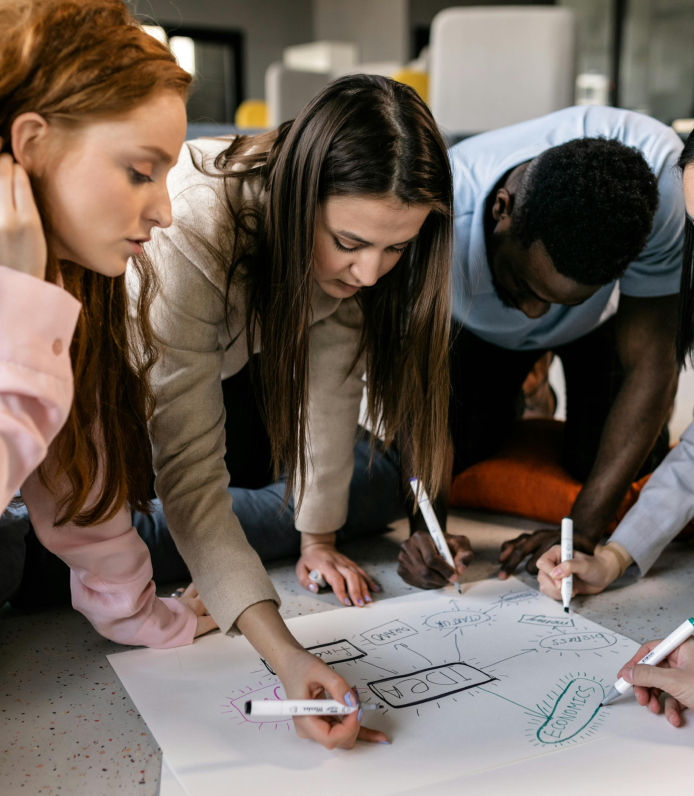 Team collaborating on business strategy in modern workspace