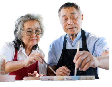 Senior couple learning how to make pottery